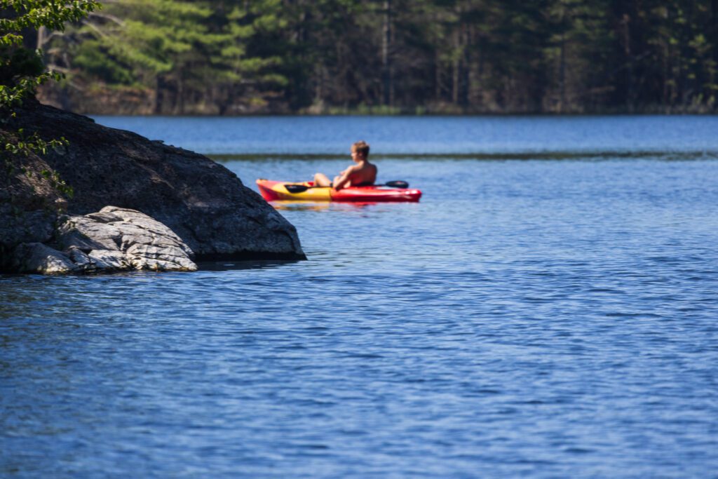 Kayaker Paddling on Rainy Lake at Voyageurs National Park in Northern Minnesota