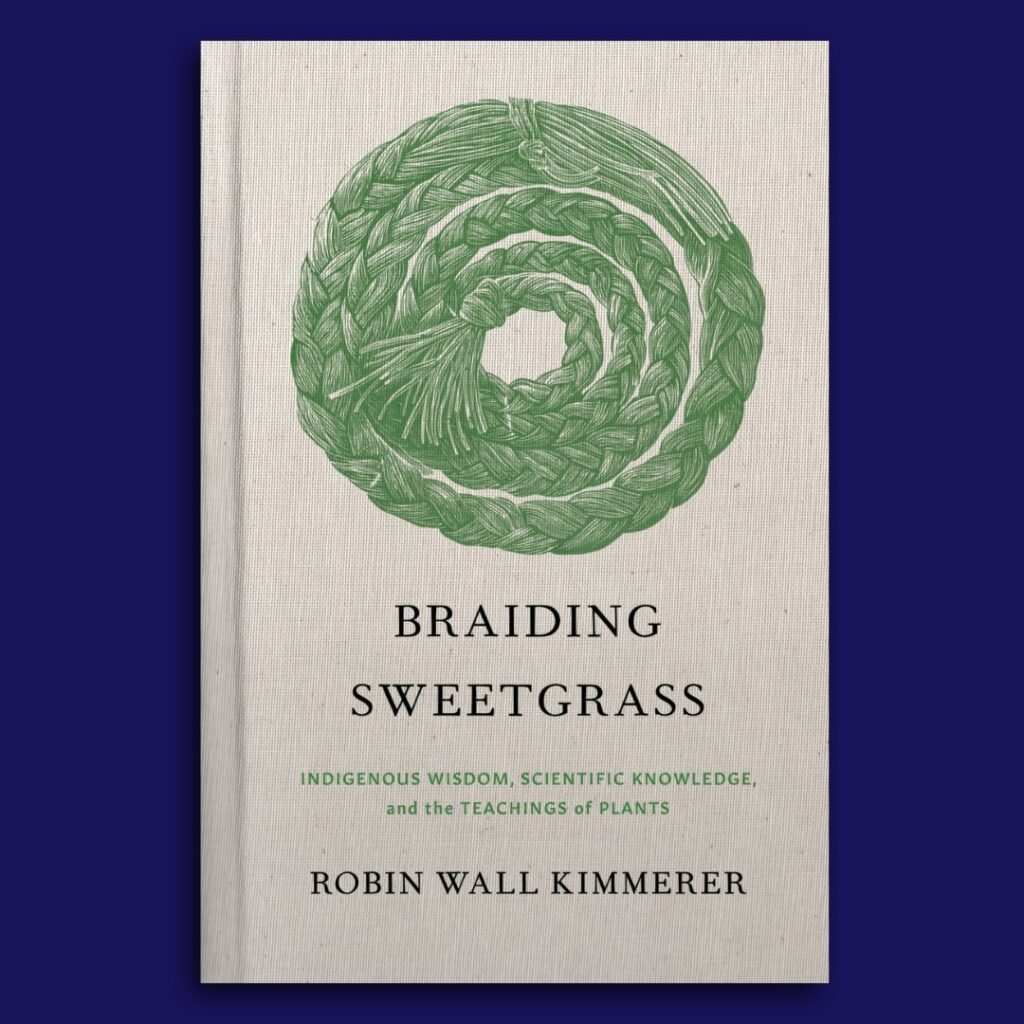 Book review image of the book cover for Braiding Sweetgrass: Indigenous Wisdom, Scientific Knowledge, and the Teachings of Plants (2013), a nonfiction environmental and Indigenous knowledge book by Robin Wall Kimmerer. The cover shows a braided circle of green sweetgrass on a neutral background, symbolizing reciprocity, tradition, and ecological wisdom.