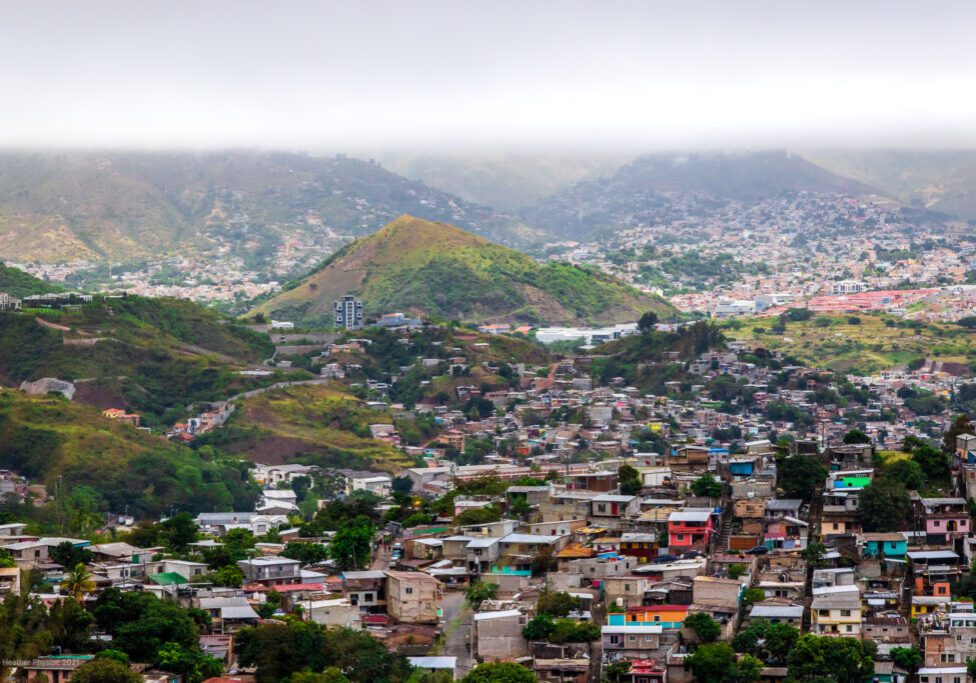 Colorful Houses Nestled At the Foot of a Mountain with Cloudy, Foggy Scene at Picacho in Tegucigalpa, Honduras
