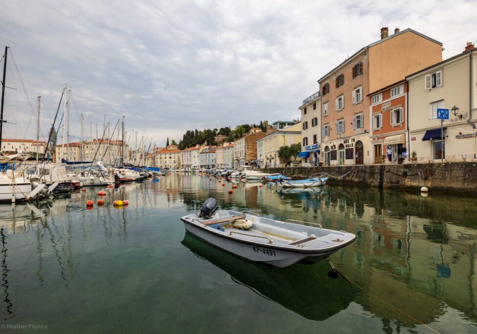 wide-angle-boat-anchored-piran-slovenia-marina